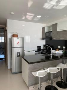 Kuchyň nebo kuchyňský kout v ubytování Apartamento Frente al Mar