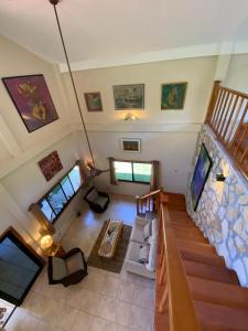 an overhead view of a living room with a staircase at Caldera River Canyon 