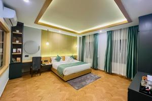 Postel nebo postele na pokoji v ubytování Hotel Aikawa