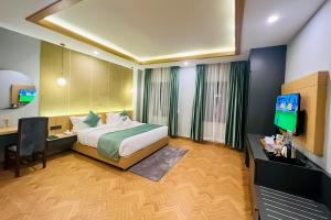 Postel nebo postele na pokoji v ubytování Hotel Aikawa