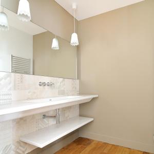 a bathroom with a sink and a mirror at L'Hôtel Particulier Beziers in Béziers +37 photos