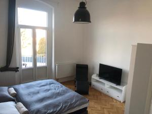 TV a/nebo společenská místnost v ubytování Apartman Kryštof