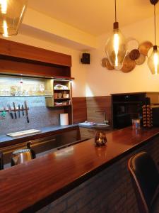 Lounge nebo bar v ubytování Ferienwohnung Schuhmann Therme Aquapulco Ikuna Erlebnispark Zoo Schmiding 20 min mit Auto entfernt mit Wintergarten und Garten ab 3 Nächte buchbar