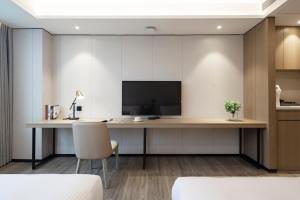 Телевизия и/или развлекателен център в CM Serviced Apartment Shenzhen Dongmen