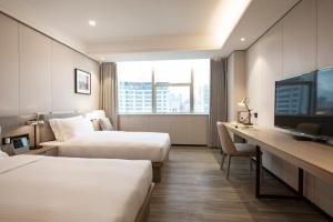 Легло или легла в стая в CM Serviced Apartment Shenzhen Dongmen