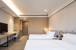 Телевизия и/или развлекателен център в CM Serviced Apartment Shenzhen Dongmen