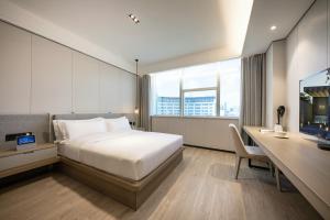 Легло или легла в стая в CM Serviced Apartment Shenzhen Dongmen