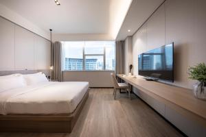 Легло или легла в стая в CM Serviced Apartment Shenzhen Dongmen