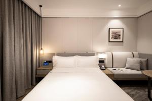 Легло или легла в стая в CM Serviced Apartment Shenzhen Dongmen