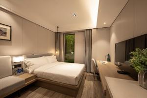Легло или легла в стая в CM Serviced Apartment Shenzhen Dongmen