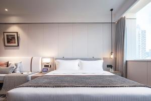 Легло или легла в стая в CM Serviced Apartment Shenzhen Dongmen