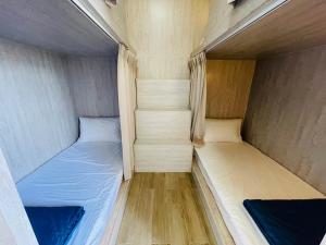 Postel nebo postele na pokoji v ubytování Wind Island B&B