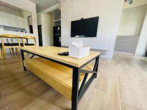 TV a/nebo společenská místnost v ubytování Wind Island B&B + 7 fotografií