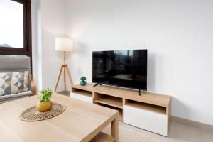 TV a/nebo společenská místnost v ubytování Las Lomas