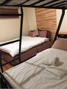 Кровать или кровати в номере Anicia Guesthouse Rooms