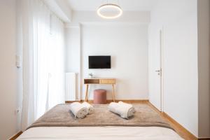 Posteľ alebo postele v izbe v ubytovaní Deluxe 4 Bedrooms Apartment in Athens Center