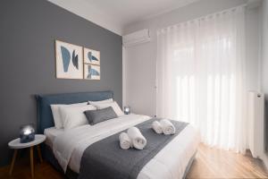 Posteľ alebo postele v izbe v ubytovaní Deluxe 4 Bedrooms Apartment in Athens Center