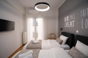 Posteľ alebo postele v izbe v ubytovaní Deluxe 4 Bedrooms Apartment in Athens Center
