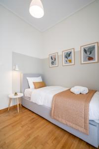 Posteľ alebo postele v izbe v ubytovaní Deluxe 4 Bedrooms Apartment in Athens Center