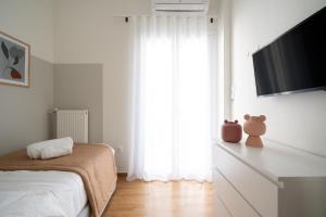 Posteľ alebo postele v izbe v ubytovaní Deluxe 4 Bedrooms Apartment in Athens Center