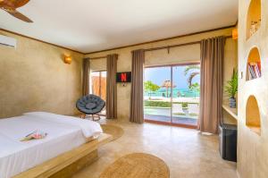 Postel nebo postele na pokoji v ubytování Safaya Luxury Villas - Adults only