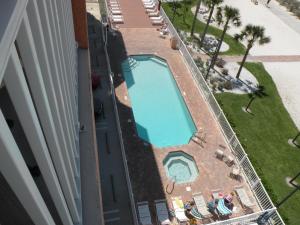 an overhead view of a swimming pool on a building at Surf Beach Treasure Island Resort in St. Pete Beach