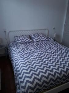 Ένα ή περισσότερα κρεβάτια σε δωμάτιο στο Baie de Somme La Haute Valériane