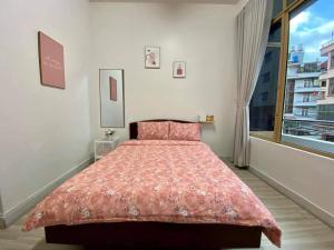 Postel nebo postele na pokoji v ubytování Vgreen Home