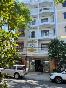 a truck parked in front of a building at Nhu Y Hotel in Tuy Hoa