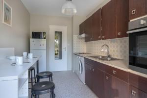 Kuchyňa alebo kuchynka v ubytovaní Charmant appartement à 200 m de la mer!