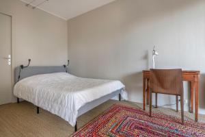 Posteľ alebo postele v izbe v ubytovaní Charmant appartement à 200 m de la mer!