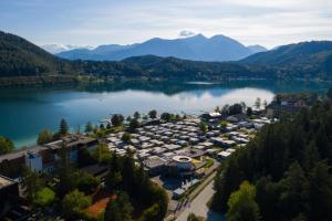 an aerial view of a resort on a lake at Camping Nord in Klopein am Klopeiner See