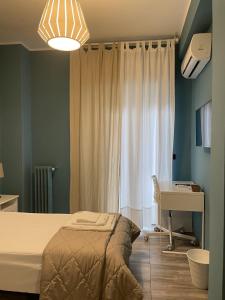 Krevet ili kreveti u jedinici u okviru objekta Interno2 Bari Centrale