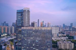 a view of a large building in a city at Liz Hotel in Guangzhou