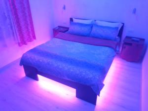 Postel nebo postele na pokoji v ubytování Apartman Hrkalovic