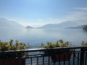 a view of the water with mountains in the background at Apartment Nicole in Menaggio