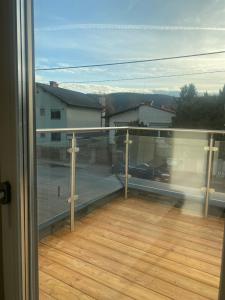 a view of a balcony with a view of a building at Haus mit Garten bei Wien in Langenzersdorf