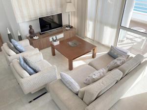 Telewizja i/lub zestaw kina domowego w obiekcie Firstline apartment RUBINO Arenal-Bol Calpe