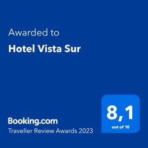 a blue sign that reads awarded to hotel vista sur at Hotel Vista Sur in Los Patos
