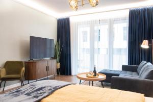 A seating area at Grand Suites Corvin