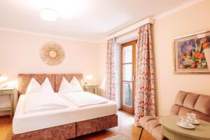 Posteľ alebo postele v izbe v ubytovaní Hubertus Boutiquehotel Filzmoos
