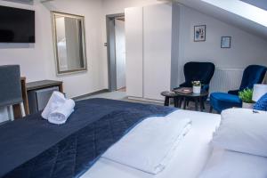 Posteľ alebo postele v izbe v ubytovaní Hotel Dolce Vita