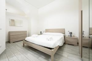 A bed or beds in a room at Vico Mastellone 16