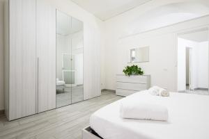 A bed or beds in a room at Vico Mastellone 16