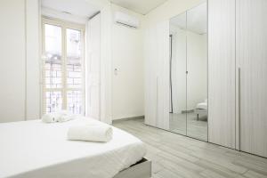 A bed or beds in a room at Vico Mastellone 16