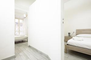 A bed or beds in a room at Vico Mastellone 16