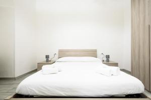 A bed or beds in a room at Vico Mastellone 16