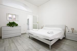 A bed or beds in a room at Vico Mastellone 16