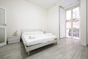A bed or beds in a room at Vico Mastellone 16
