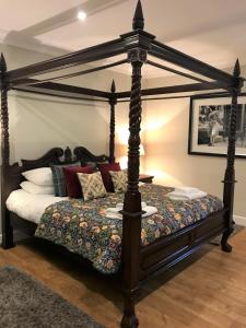 Posteľ alebo postele v izbe v ubytovaní Cherry Blossom Cottage